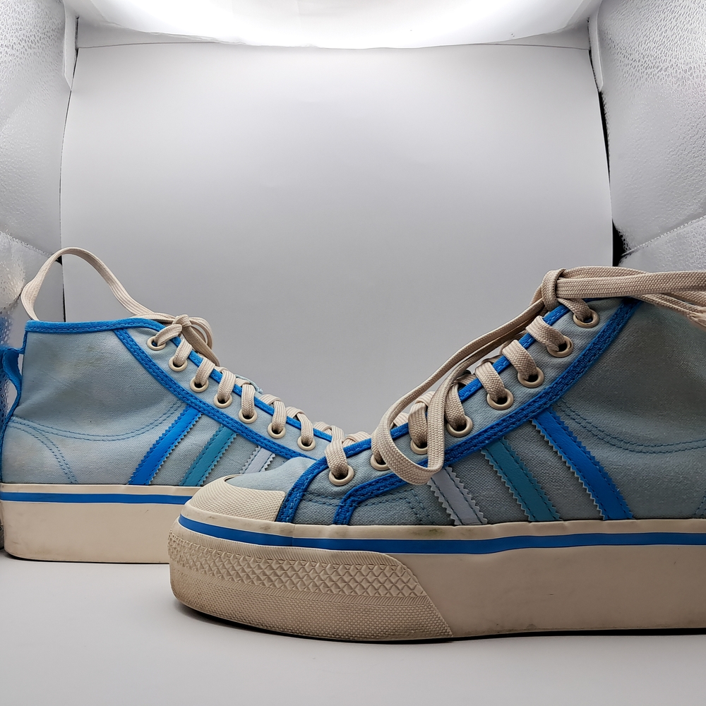 Adidas Blue and White Athletic Shoes with Vintage Appeal